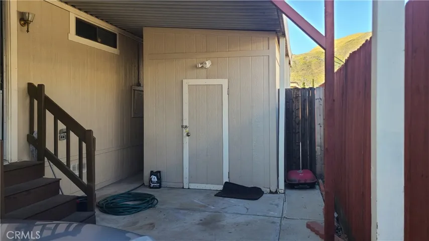 Shed on Side Yard behind Carport