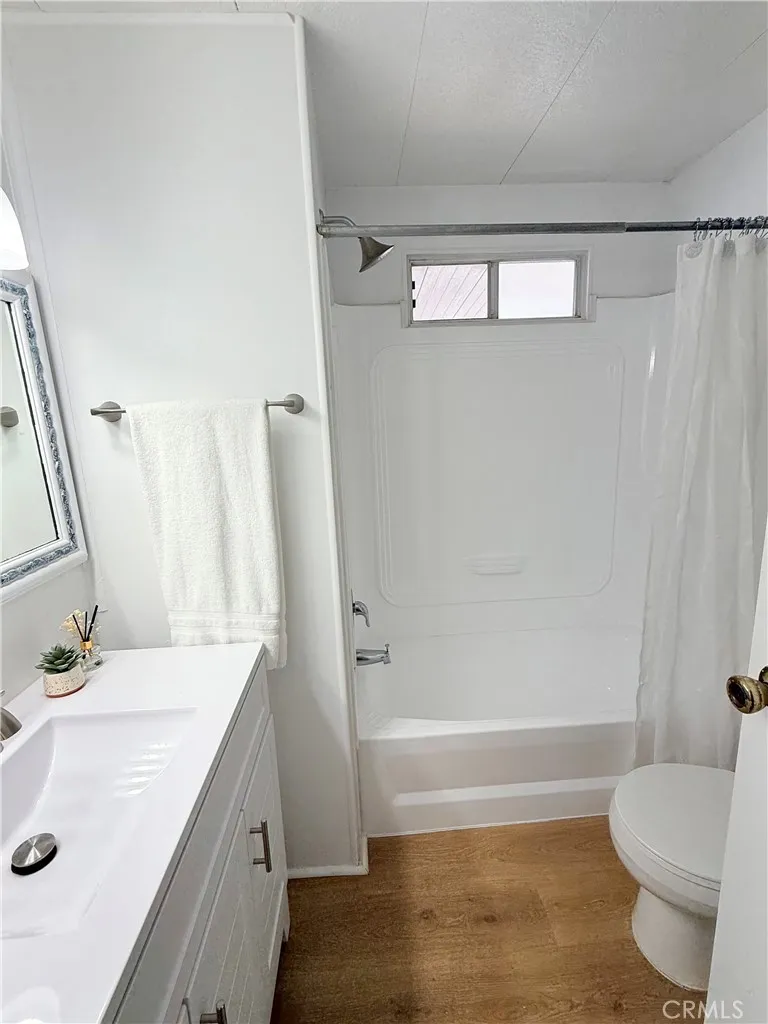 new vanity, floors and updated shower stall