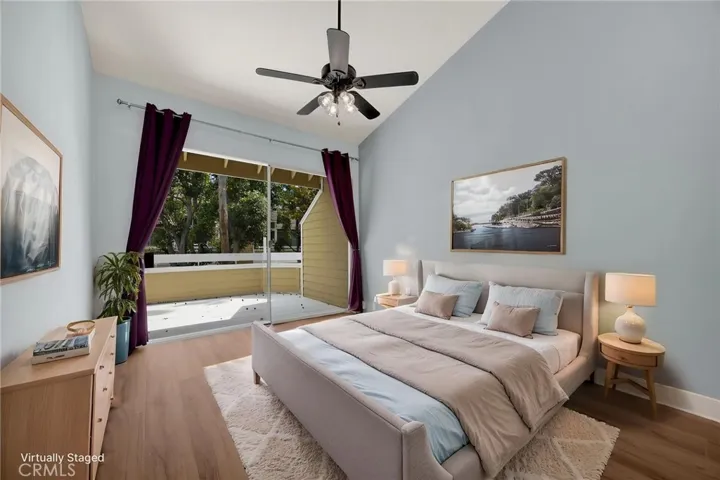 VIRTUALLY STAGED Main master bedroom overlooks patio with babbling creek below