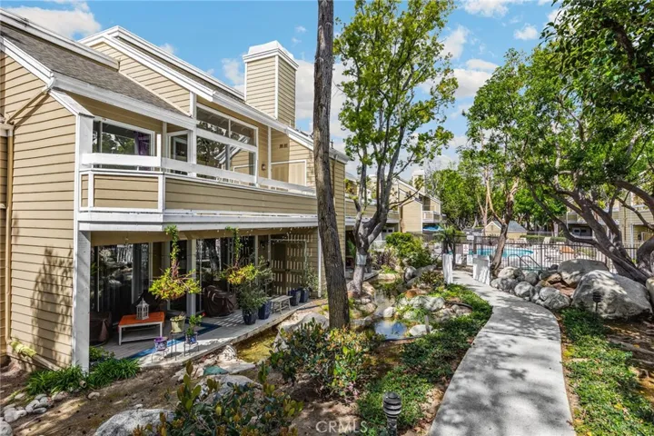 Upstairs unit offers the view of trees and babbling creek below.