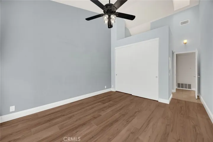 Main master bedroom overlooks patio with babbling creek below