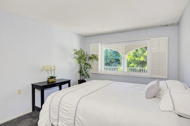 Guest Bedroom -Property is unfurnished - staging furniture in photo.