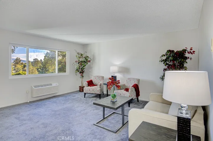 Property is unfurnished - staging furniture in photo.