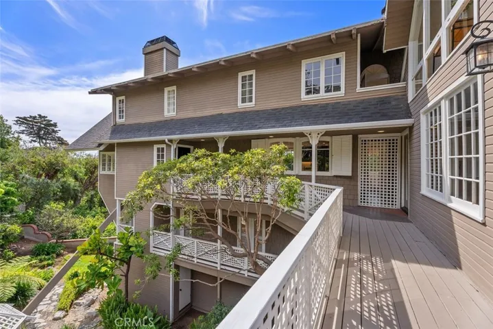 Charming entry deck leading to the home.