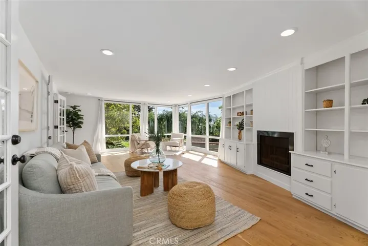 Downstairs on the first floor is the bonus room with a fireplace.  This can be used for entertaining, studying, and so much more!
