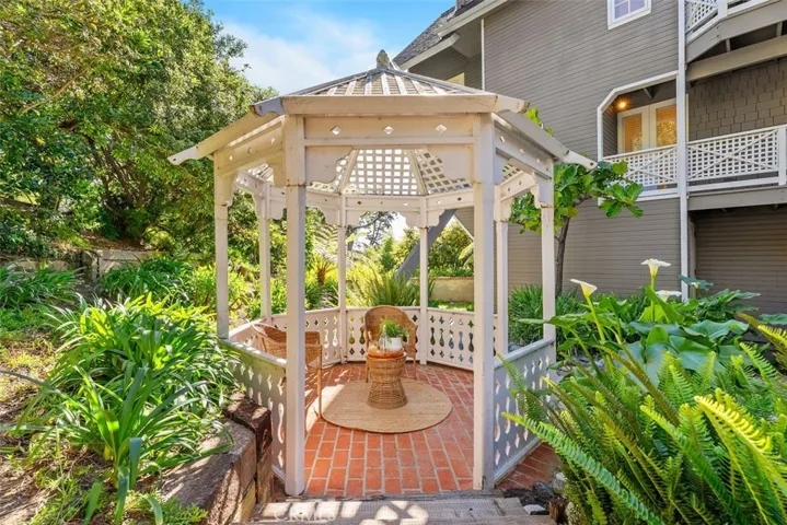 Charming gazebo can be a tranquil spot to read a book and enjoy a cup of coffee!