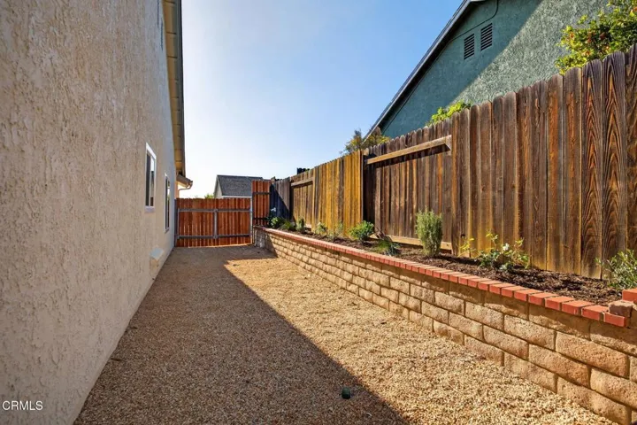 Side Yard with Gated Access