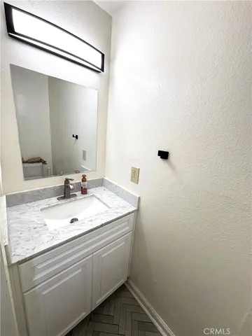 HALF BATHROOM NEXT TO ENTRANCE 2