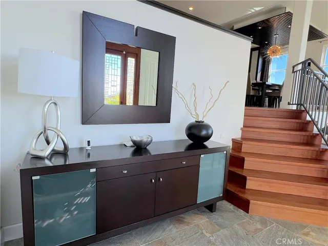 Entry and steps lead to the main living area