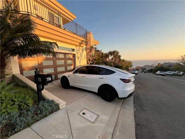 Tesla charging station in the garage.