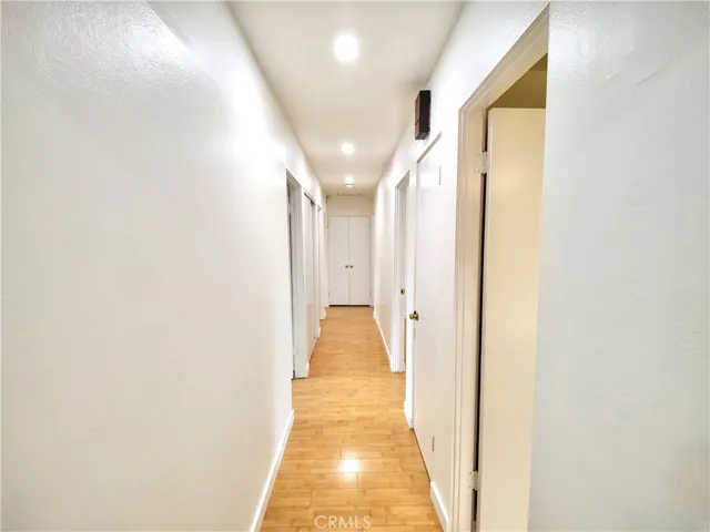 Hallway leading to bedrooms and bathrooms
