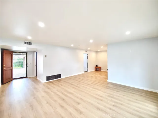 SPACIOUS living room leads into the dining area
