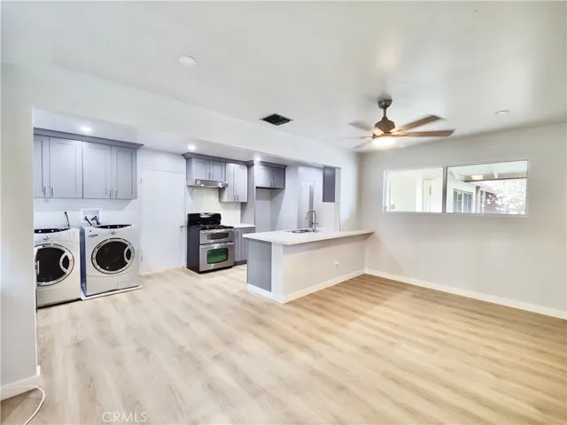 Kitchen opens into living room