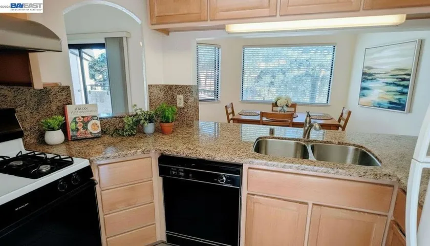virtually staged kitchen and dining area