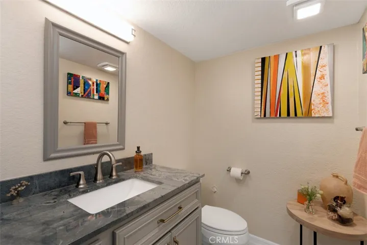 Downstairs luxurious powder room.