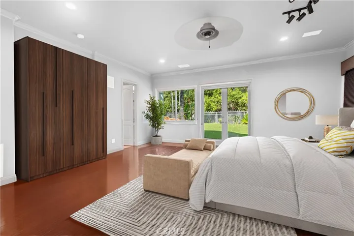 Home theater virtually staged as a bedroom