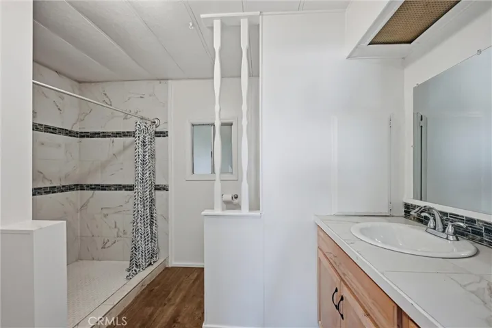 Updated bathroom with tile shower
