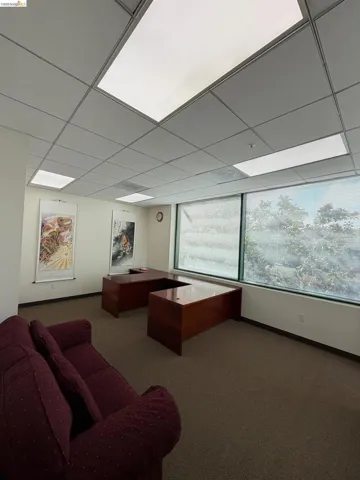 Home office featuring a paneled ceiling