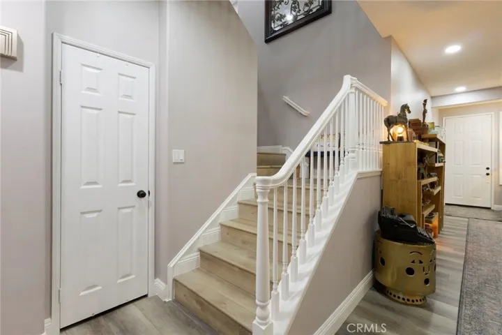 Stair case leading upstairs to all bedrooms and loft.