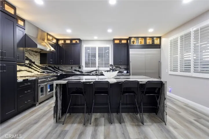 Frontal view of the kitchen from the large dinning room.