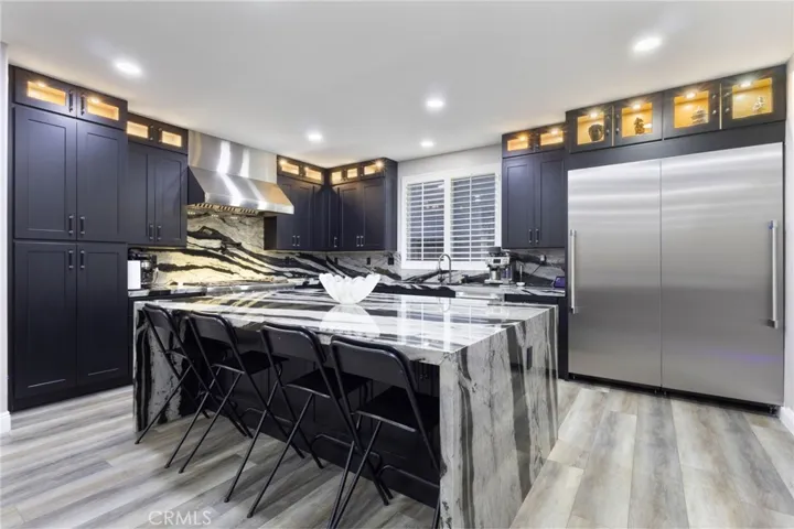 Stunning Chef's Kitchen. A culinary dream for cooking enthusiasts, with all commerical grade Thermador appliances.