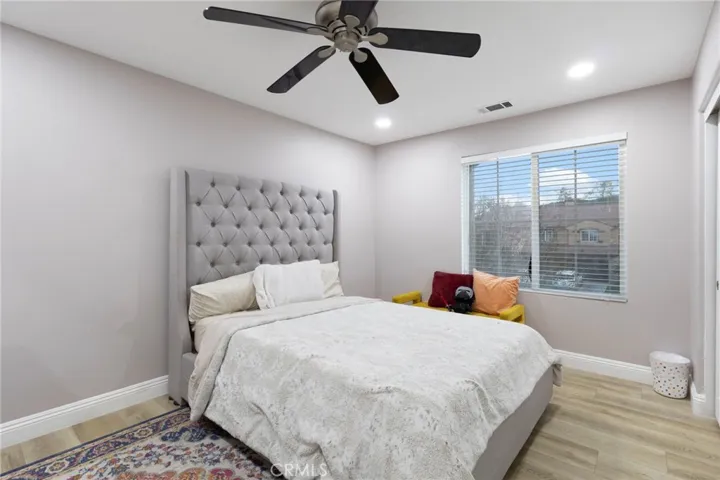 Fifth bedroom, with large three door closet on right side.