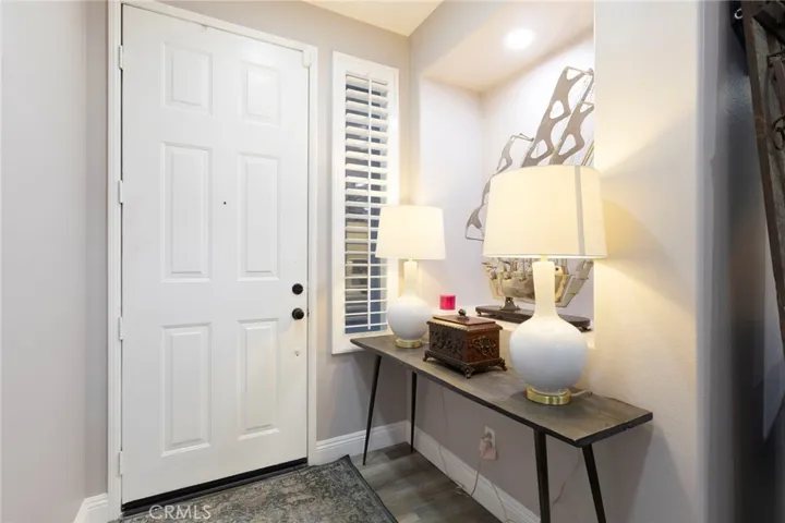 Inside the foyer, looking at the front door.