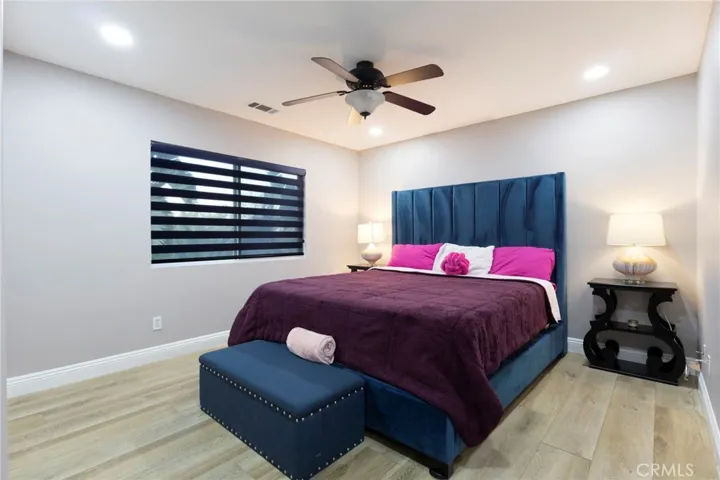Second bedroom, with a full jack and jill bathroom access on the right side.