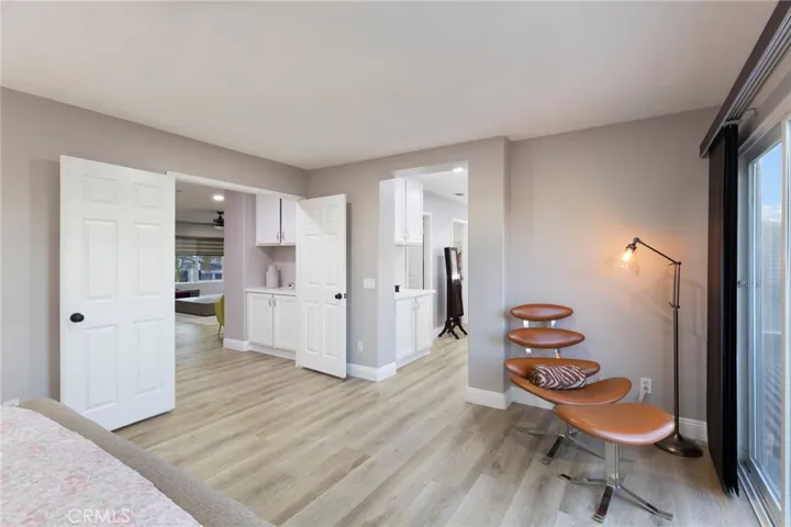 View from near the master balcony, the middle hallway leading to a luxury master suite with oversized his and hers walk in closets.