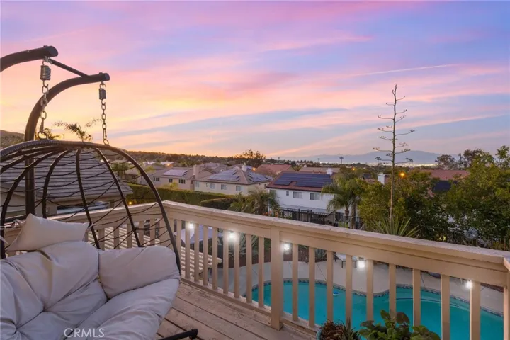 View from private master suite balcony with sweeping city views that expand all the way north up to the mountains.
