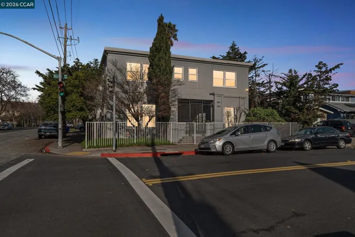 Prime Civic Center corner location; traditional stucco fourplex near Richmond's transit hub.