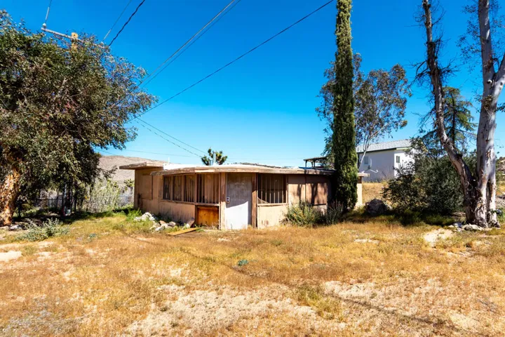 Non-Occupied House at back of property