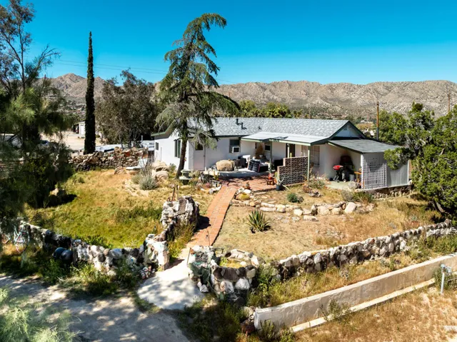 House is nestled on a small knoll