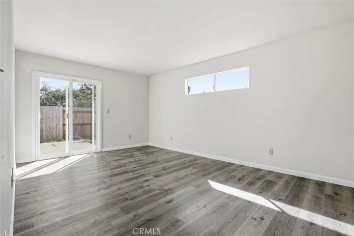 Primary bedroom has a sliding door to the yard