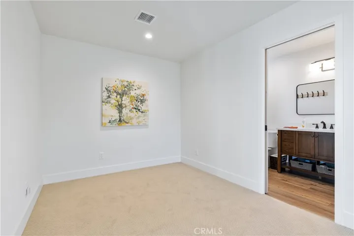 Full bath upstairs with 3 bedrooms