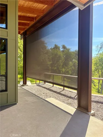 Automatic shade screen for primary bedroom.