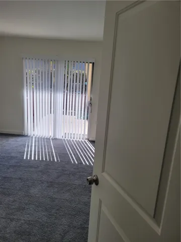 Bedroom two, with slider to private yard.