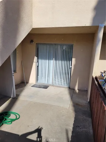 Bedroom two has sliding glass door the private yard,