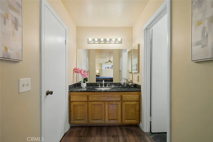 Primary en suite with private commode and shower in tub. Walk in closet to the left.