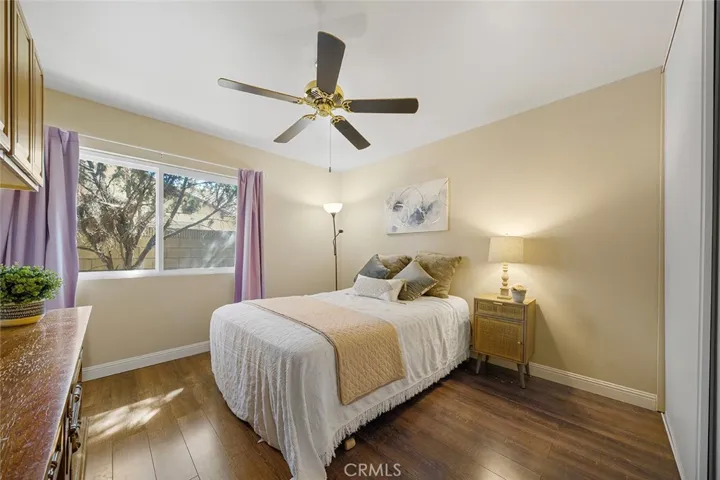 Three of four bedrooms with built ins and ceiling fan.
