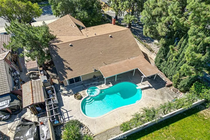 Aerial view of the home with pool.