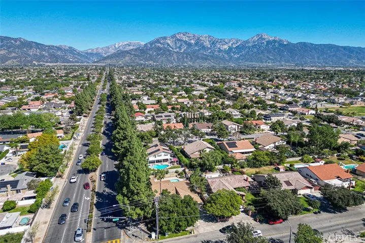 Lower middle of the image is the home on the corner of Mountain and 13th. North, are the foothills.