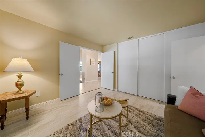 One of four bedrooms with double doors to the formal entry. This room is also great to use as a den, guest room, or however you wish to use.