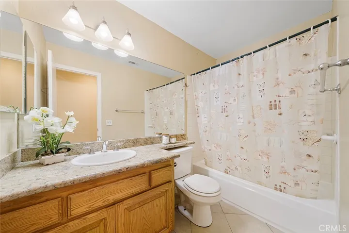 Guest bath with shower in tub.