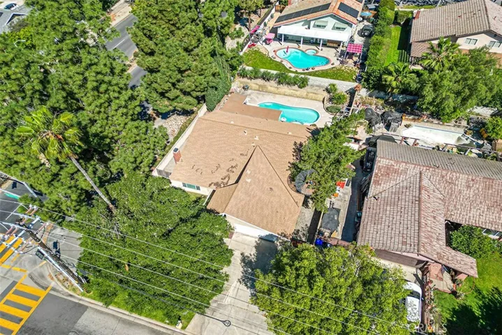 Aerial view of the home with pool. Corner of Mountain and 13th.