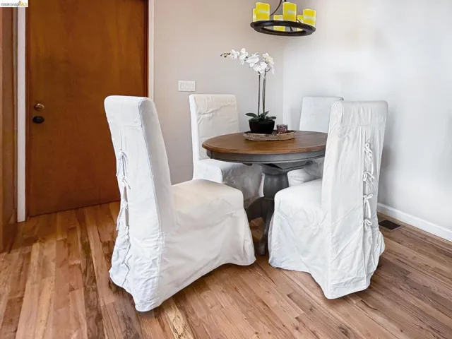 Dining room with a chandelier and light wood finished floors