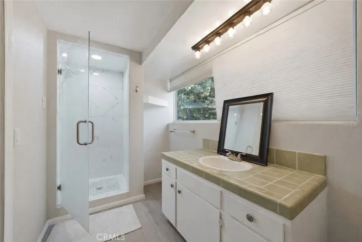 bottom floor bathroom. visual or ai adjustments may have been used
