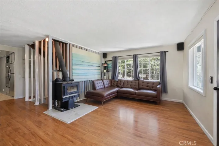 family room and entry. visual or ai adjustments may have been used