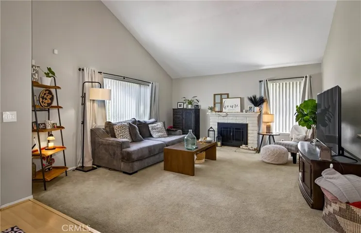 Family room with lots of light and fireplace