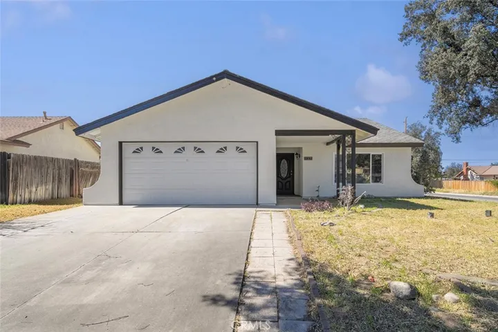 Newly painted single level home on a corner lot.